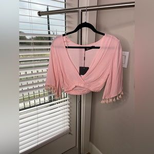 Misguided pink fringe crop top